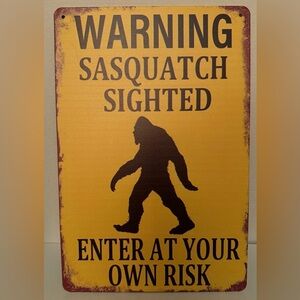 Yellow Sasquatch Warning Metal Sign